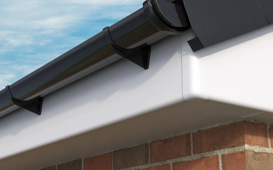 A genuine D.J.K Roofcare job — new fascias, soffits and guttering on a house